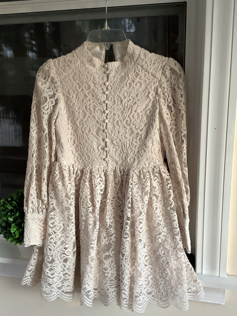Ivory Lace Long-Sleeve Babydoll Dress it is feel more like 10